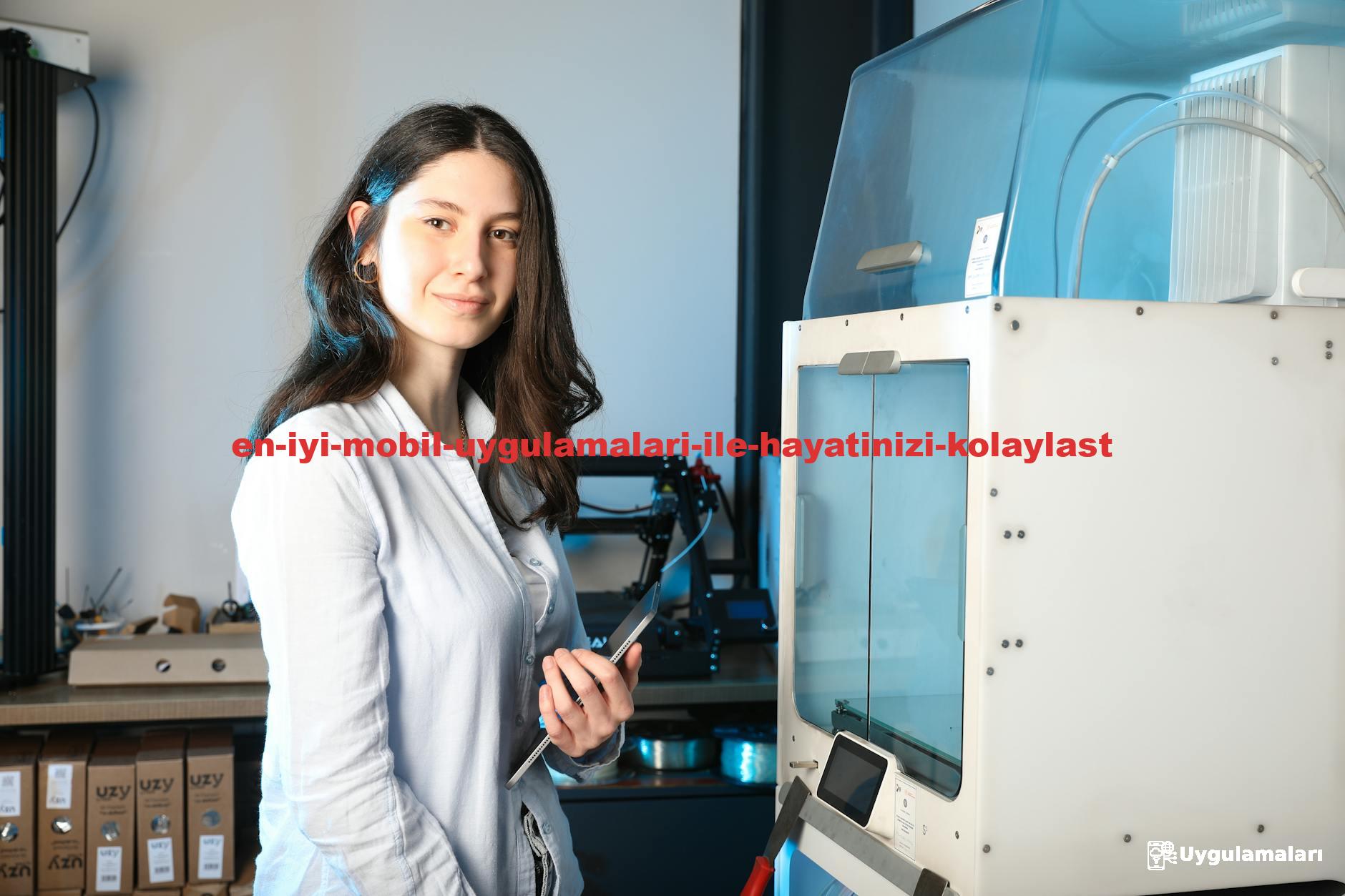 Confident young female engineer holding a tablet beside a 3D printer in a modern indoor setting.