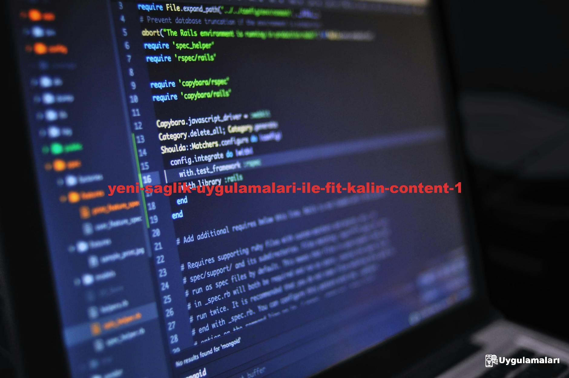 Close-up of a computer screen displaying programming code in a dark environment.
