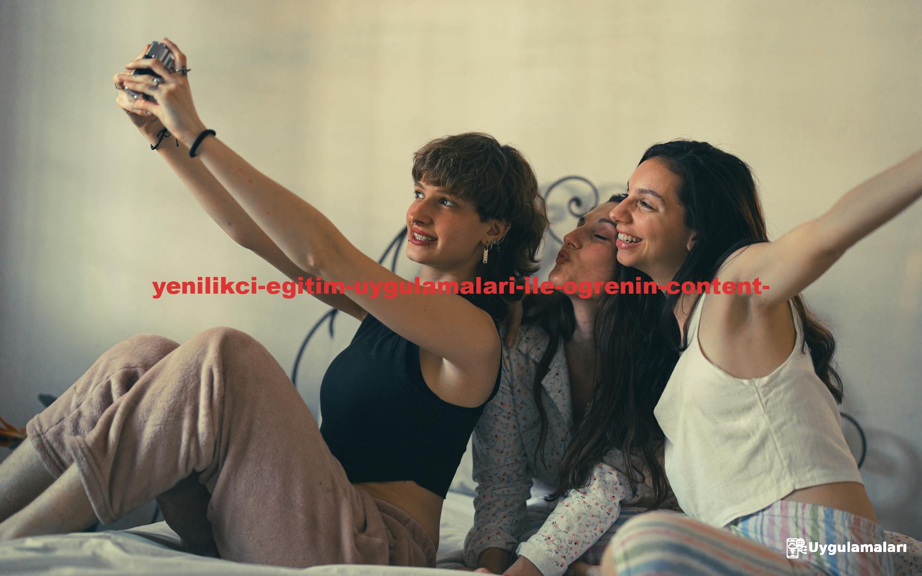 Three young women enjoying a casual selfie moment together indoors.