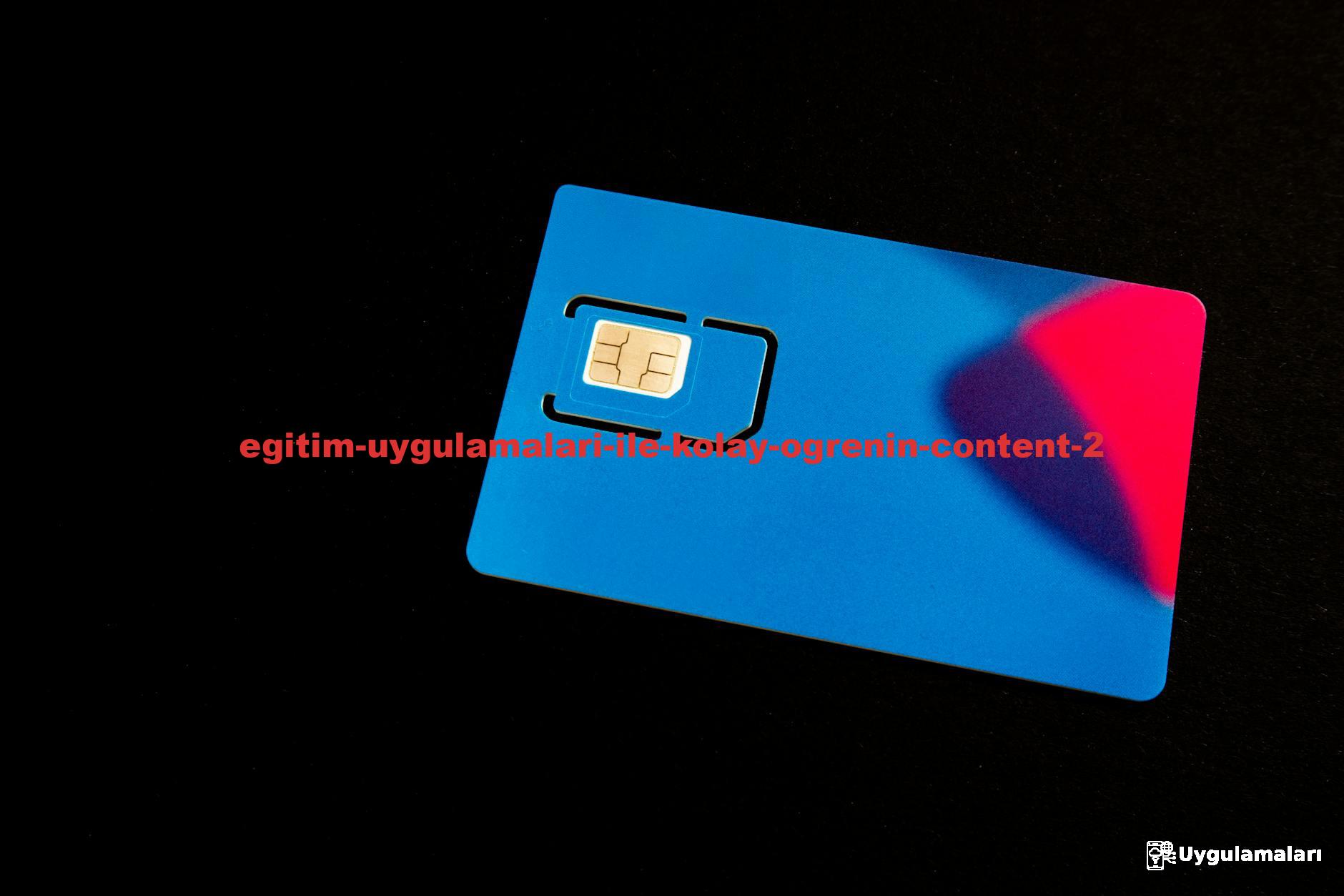 A blue SIM card on a dark background with vibrant red and purple accents.