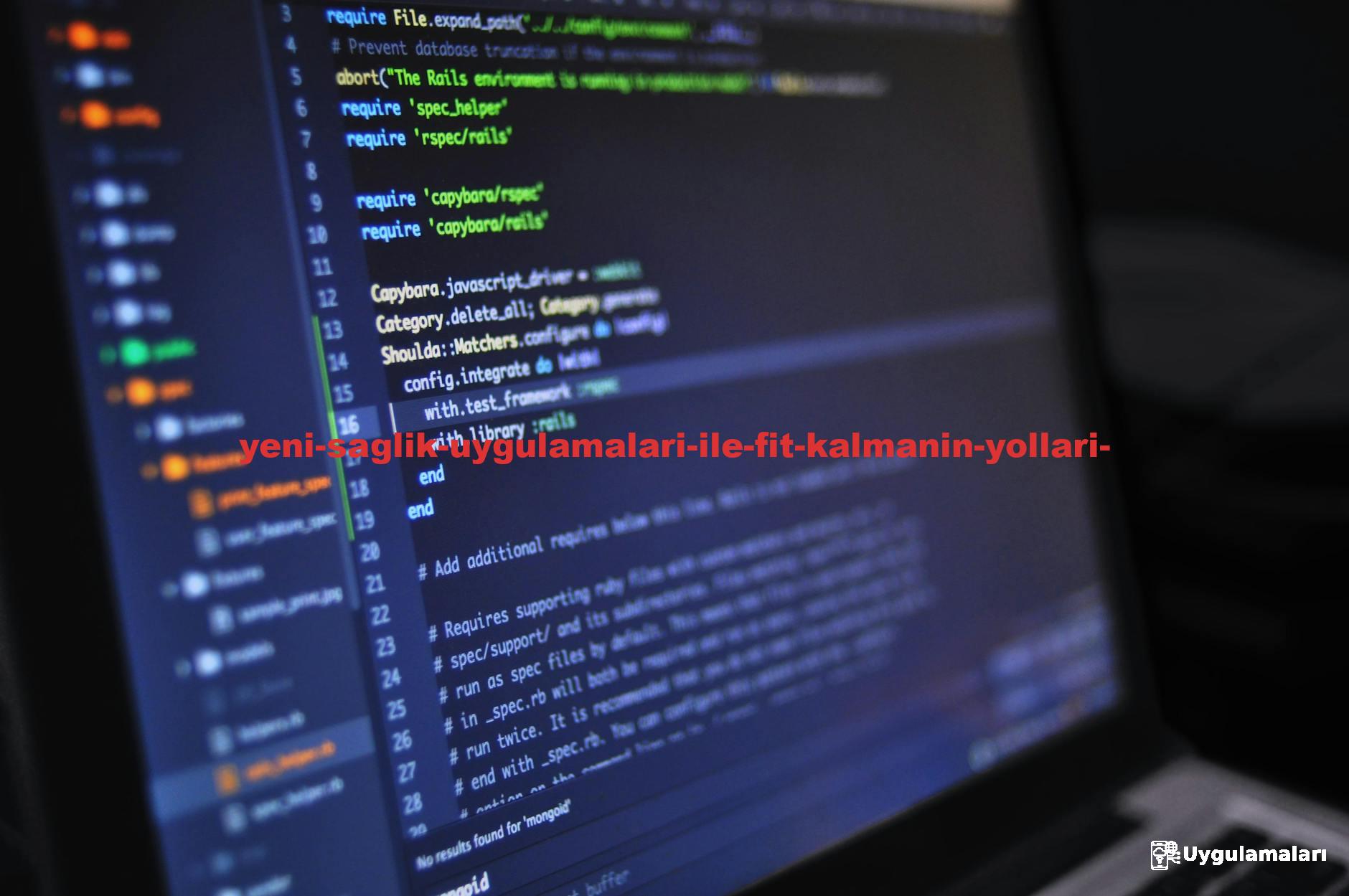 Close-up of a computer screen displaying programming code in a dark environment.