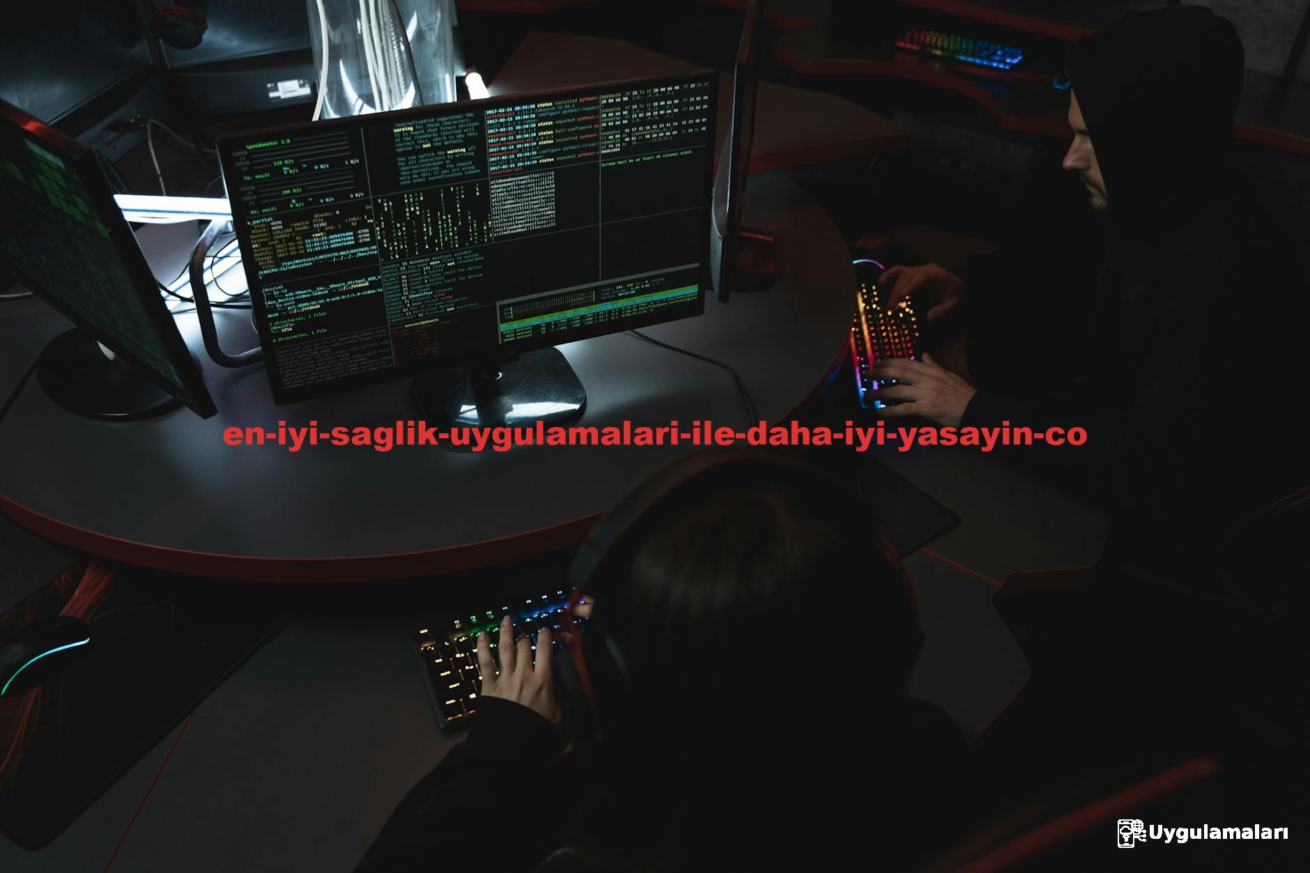 A group of people in a dark room working on computers, related to cybersecurity.