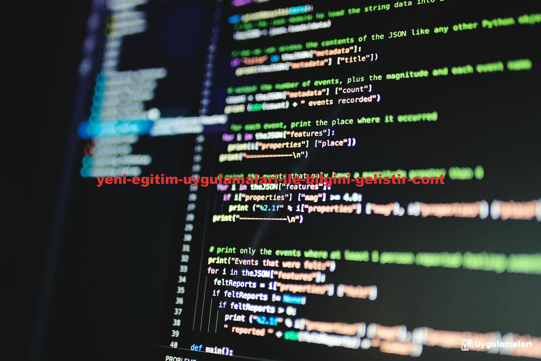 Close-up of colorful programming code displayed on a computer monitor with a dark background.